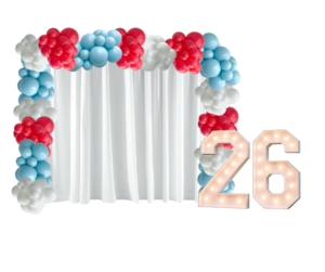 The Ultimate Grad Glow Package: Curtain Backdrop, Balloon Garlands and '26' Marquee Lights