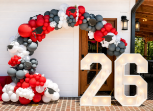 The Signature Grad Ring: Circle Arch, Balloon Garlands and '26' Marquee Lights